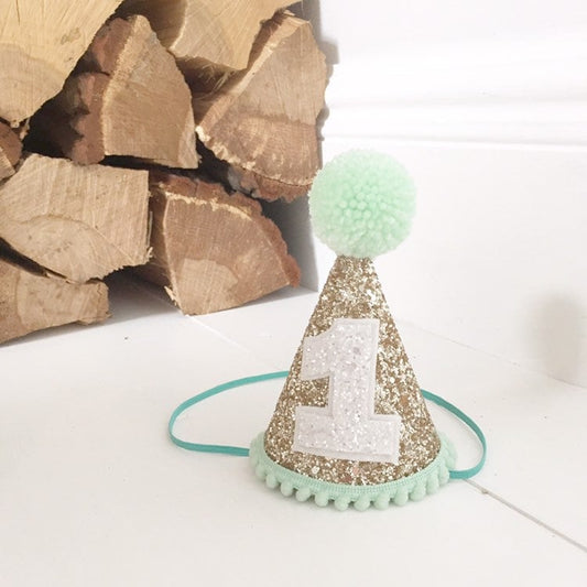 Gold and mint cone hat