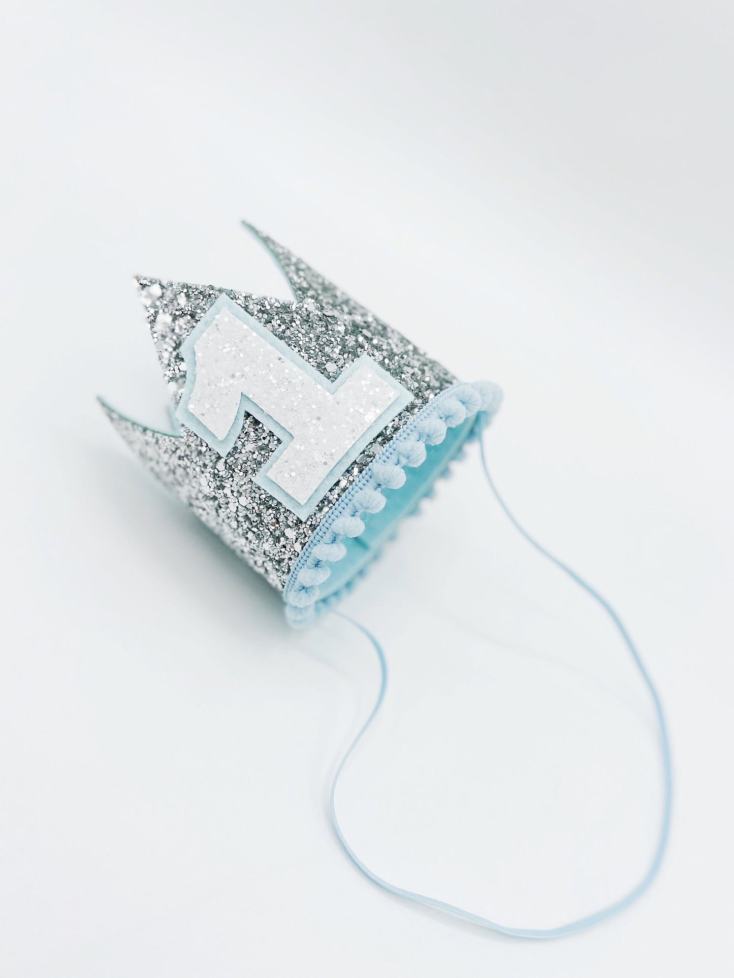 Silver and blue crown