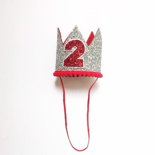 Silver and red crown