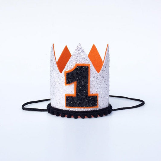 White Glitter birthday crown with orange and black detail.