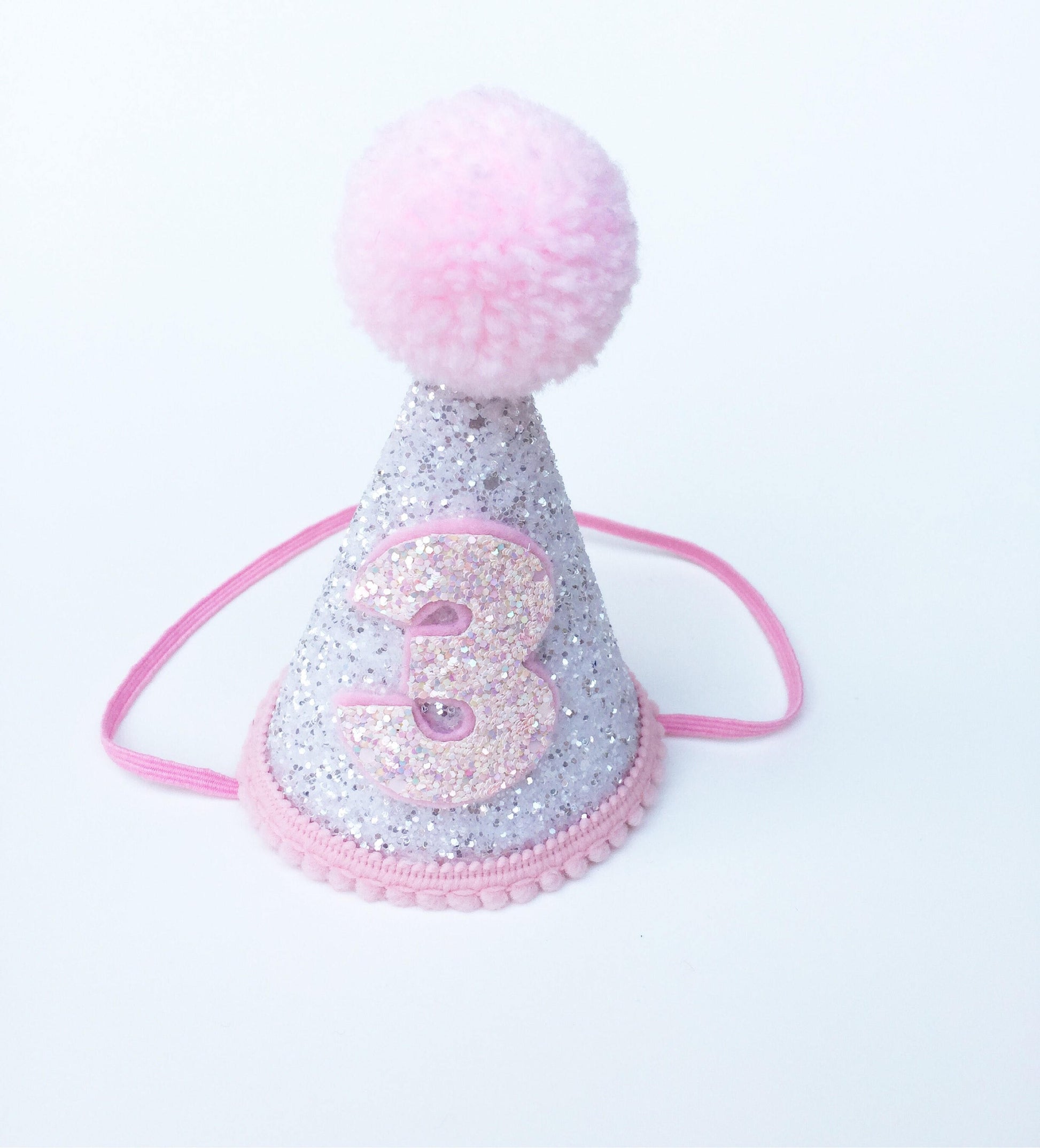 White and pink cone hat